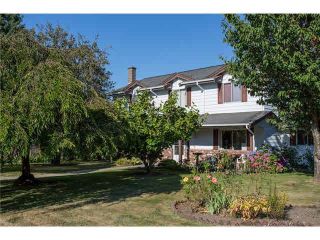 Photo 1: 8480 DELAWARE Road in Richmond: Woodwards House for sale : MLS®# R2855612