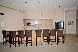 Photo 36: 1407 92 CRYSTAL SHORES Road: Okotoks Apartment for sale : MLS®# A1222250