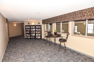Photo 25: 218 52 Cranfield Link SE in Calgary: Cranston Apartment for sale : MLS®# A1205136
