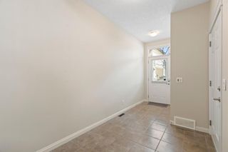 Photo 4: 1109 Wentworth Villas SW in Calgary: West Springs Row/Townhouse for sale : MLS®# A2129861