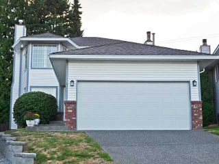 Photo 1: 628 LOST LAKE Drive in Coquitlam: Coquitlam East House for sale in "RIVER HEIGHTS" : MLS®# V1137648
