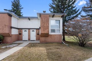 Photo 1: 107 Pinemont Bay NE in Calgary: Pineridge Row/Townhouse for sale : MLS®# A2123325