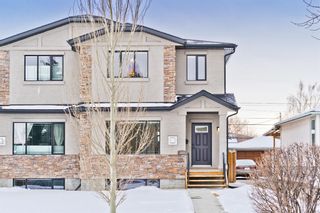 Photo 1: 247 24 Avenue NW in Calgary: Tuxedo Park Semi Detached for sale : MLS®# A1187428