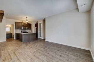 Photo 2: 1411 2461 Baysprings Link SW: Airdrie Row/Townhouse for sale : MLS®# A2125442