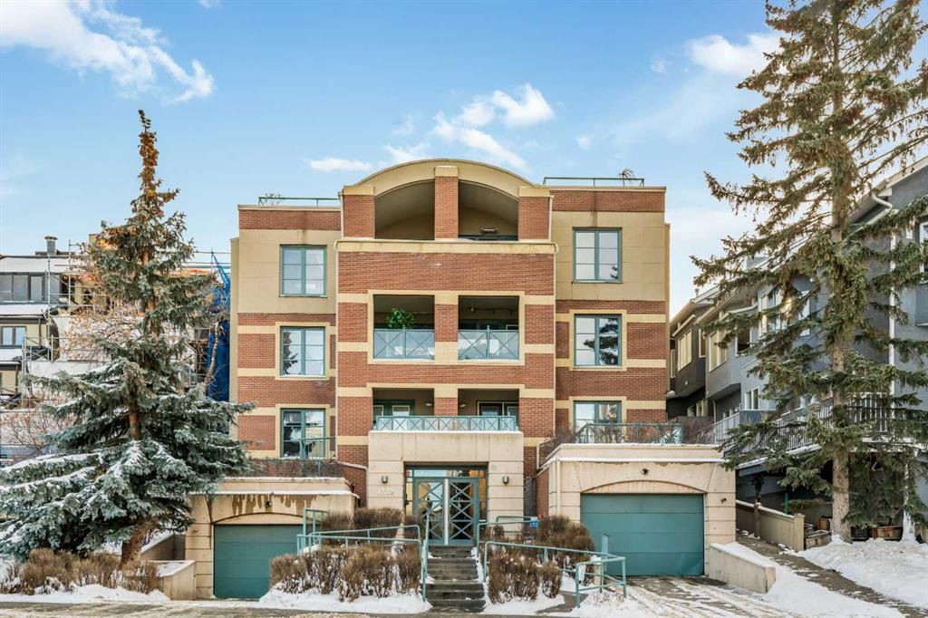 Main Photo: 102 1235 Cameron Avenue SW in Calgary: Lower Mount Royal Apartment for sale : MLS®# A2101978
