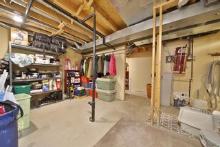 Photo 31: 10 388 Sandarac Drive NW in Calgary: Sandstone Valley Row/Townhouse for sale : MLS®# A1181075