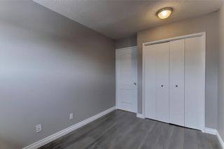 Photo 15: 104 2720 RUNDLESON Road NE in Calgary: Rundle Row/Townhouse for sale : MLS®# C4221687