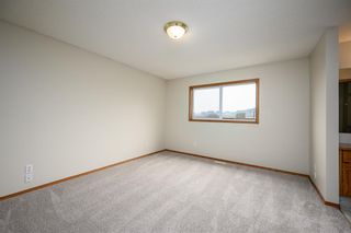 Photo 12: 208 Quigley Drive: Cochrane Semi Detached (Half Duplex) for sale : MLS®# A2050566
