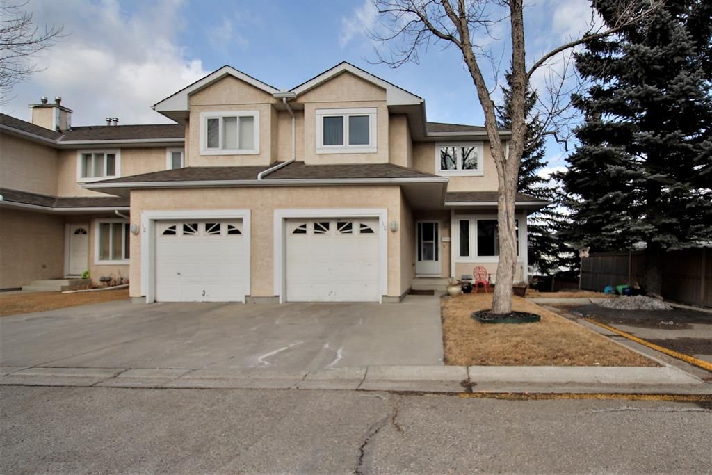Main Photo: 10 388 Sandarac Drive NW in Calgary: Sandstone Valley Row/Townhouse for sale : MLS®# A1181075