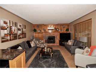 Photo 11: 39 SANDALWOOD Heights NW in Calgary: Sandstone House for sale : MLS®# C4025285