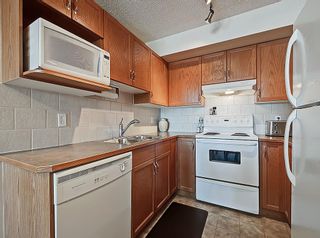 Photo 4: 307 300 Edwards Way NW: Airdrie Apartment for sale : MLS®# A2013227