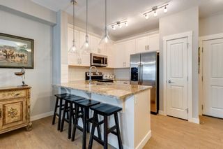 Photo 5: 101 130 Auburn Meadows View SE in Calgary: Auburn Bay Apartment for sale : MLS®# A1253190