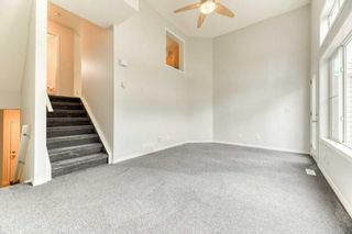 Photo 9: 156 Everhollow Heights SW in Calgary: Evergreen Row/Townhouse for sale : MLS®# A2123116