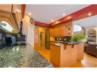 Photo 9: 243 STRATHRIDGE Place SW in Calgary: Strathcona Park House for sale : MLS®# C4101454