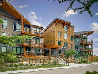 Photo 1: 117 106 Stewart Creek Rise: Canmore Apartment for sale : MLS®# A2080711