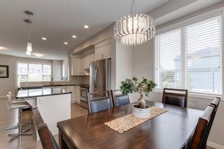 Photo 14: 214 Panatella Walk NW in Calgary: Panorama Hills Row/Townhouse for sale : MLS®# A1225557