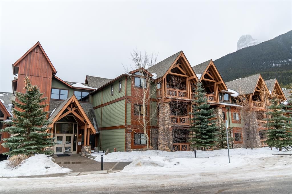 Main Photo: 206 106 Stewart Creek Landing: Canmore Apartment for sale : MLS®# A2032064