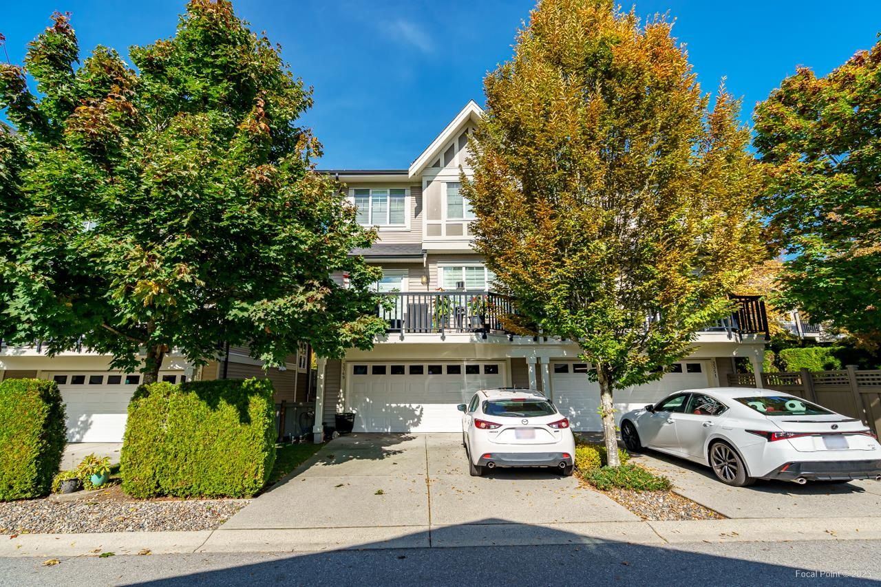 Main Photo: 3349 DEVONSHIRE Avenue in Coquitlam: Burke Mountain Townhouse for sale in "BELMONT PARK" : MLS®# R2826894
