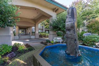 Photo 1: 323 19528 FRASER Highway in Surrey: Cloverdale BC Condo for sale in "FAIRMONT" (Cloverdale)  : MLS®# R2310771