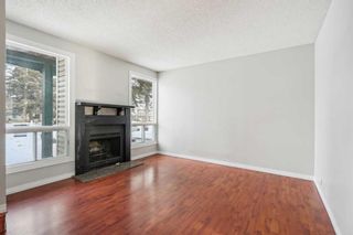 Photo 2: 29 Woodhill Court SW in Calgary: Woodlands Row/Townhouse for sale : MLS®# A2092494