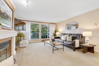 Photo 3: 304 2733 ATLIN Place in Coquitlam: Coquitlam East Condo for sale in "ATLIN COURT" : MLS®# R2820393