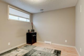 Photo 25: 175 Cougarstone Court SW in Calgary: Cougar Ridge Detached for sale : MLS®# A1130400