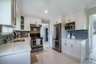 Photo 12: 6438 WILTSHIRE Street in Sardis: Sardis West Vedder Rd House for sale : MLS®# R2560024