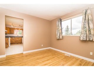Photo 8: 1240 MEADOWBROOK Drive SE: Airdrie House for sale : MLS®# C4031774