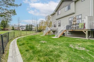 Photo 28: 42 Crystal Shores Cove: Okotoks Row/Townhouse for sale : MLS®# A1218306