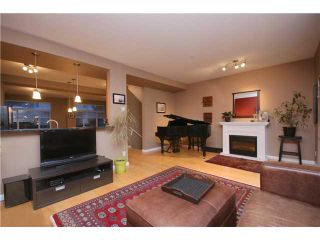 Photo 4: 39 40632 GOVERNMENT Road in Squamish: Brackendale Townhouse for sale in "RIVERSWALK" : MLS®# V1046439