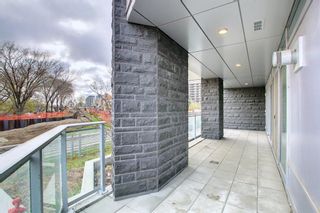 Photo 5: 102 128 Waterfront Court SW in Calgary: Eau Claire Apartment for sale : MLS®# A1232100