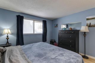 Photo 20: 322 Woodvale Crescent SW in Calgary: Woodlands Row/Townhouse for sale : MLS®# A2015272