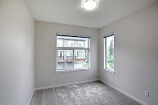 Photo 32: 107 Chapalina Square SE in Calgary: Chaparral Row/Townhouse for sale : MLS®# A1229186
