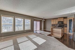 Photo 3: 32 Everwillow Green SW in Calgary: Evergreen Detached for sale : MLS®# A1188019