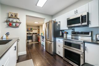 Photo 1: 104 2285 PITT RIVER Road in Port Coquitlam: Central Pt Coquitlam Condo for sale in "SHAUGHNESSY MANOR" : MLS®# R2727736