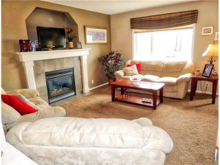 Photo 11: 1010 BRIDLEMEADOWS Manor SW in Calgary: Bridlewood House for sale : MLS®# C4065914