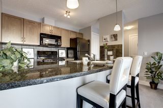Photo 5: 6 305 VILLAGE Mews SW in CALGARY: Prominence_Patterson Condo for sale (Calgary)  : MLS®# C3599226