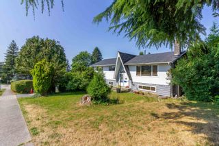 Photo 1: 406 SCHOOLHOUSE Street in Coquitlam: Central Coquitlam House for sale : MLS®# R2811350