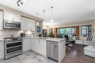 Photo 2: 305 14588 MCDOUGALL Drive in Surrey: King George Corridor Condo for sale in "Forest Ridge" (South Surrey White Rock)  : MLS®# R2876063