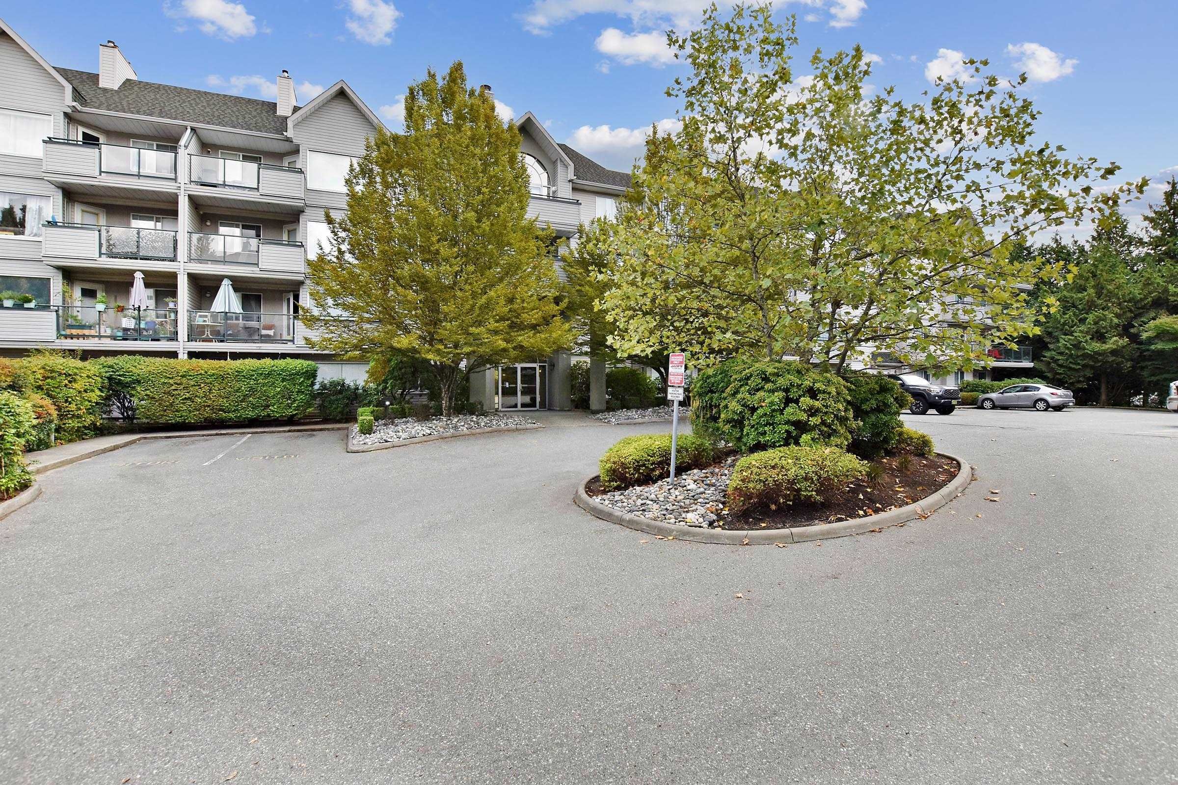 Main Photo: 410 33718 KING Road in Abbotsford: Poplar Condo for sale in "COLLEGE PARK" : MLS®# R2807949