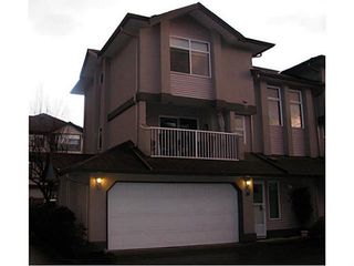 Photo 1: 19 2538 PITT RIVER Road in Port Coquitlam: Mary Hill Townhouse for sale in "RIVERCOURT" : MLS®# V1100563