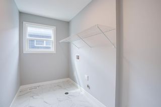 Photo 23: 54 Midtown Crossing SW: Airdrie Detached for sale : MLS®# A2043456
