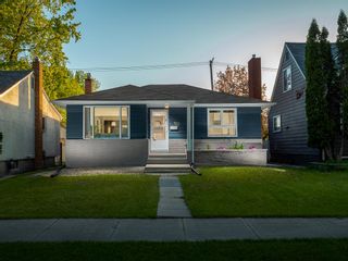 Photo 1: 553 Beaverbrook Street in Winnipeg: River Heights Residential for sale (1D)  : MLS®# 202213220