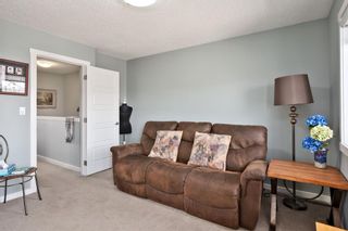 Photo 18: 107 2400 Ravenswood View SE: Airdrie Row/Townhouse for sale : MLS®# A2130554