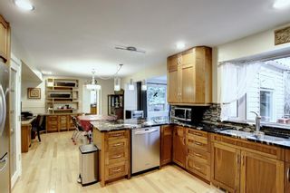 Photo 7: 1311 70 Avenue SW in Calgary: Kelvin Grove Detached for sale : MLS®# A1214141