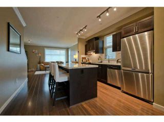 Photo 3: 720 ORWELL Street in North Vancouver: Lynnmour Townhouse for sale in "WEDGEWOOD" : MLS®# V1050702