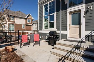Photo 4: 139 Cranbrook Walk SE in Calgary: Cranston Row/Townhouse for sale : MLS®# A2114381