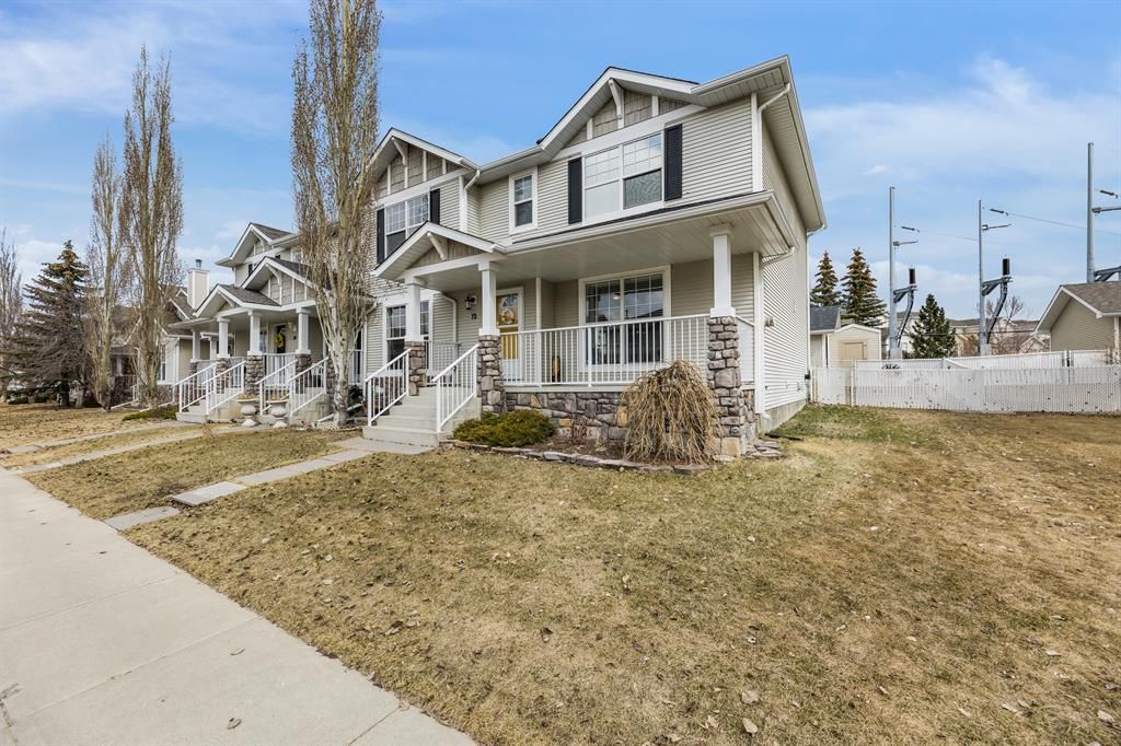 Main Photo: 72 West Springs Way SW in Calgary: West Springs Semi Detached (Half Duplex) for sale : MLS®# A2037993