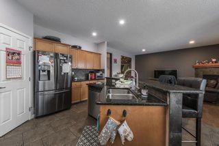 Photo 7: 109 Cougarstone Manor SW in Calgary: Cougar Ridge Detached for sale : MLS®# A2022531
