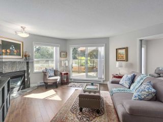 Photo 3: 406 1500 OSTLER Court in North Vancouver: Indian River Condo for sale in "Mountain Terrace" : MLS®# R2330949